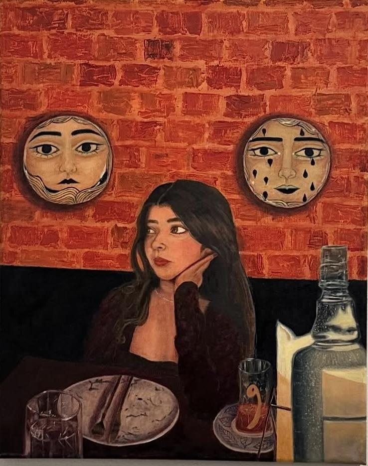 A woman seated at a dinner table before a red brick wall, watched by two moon-faced plates.